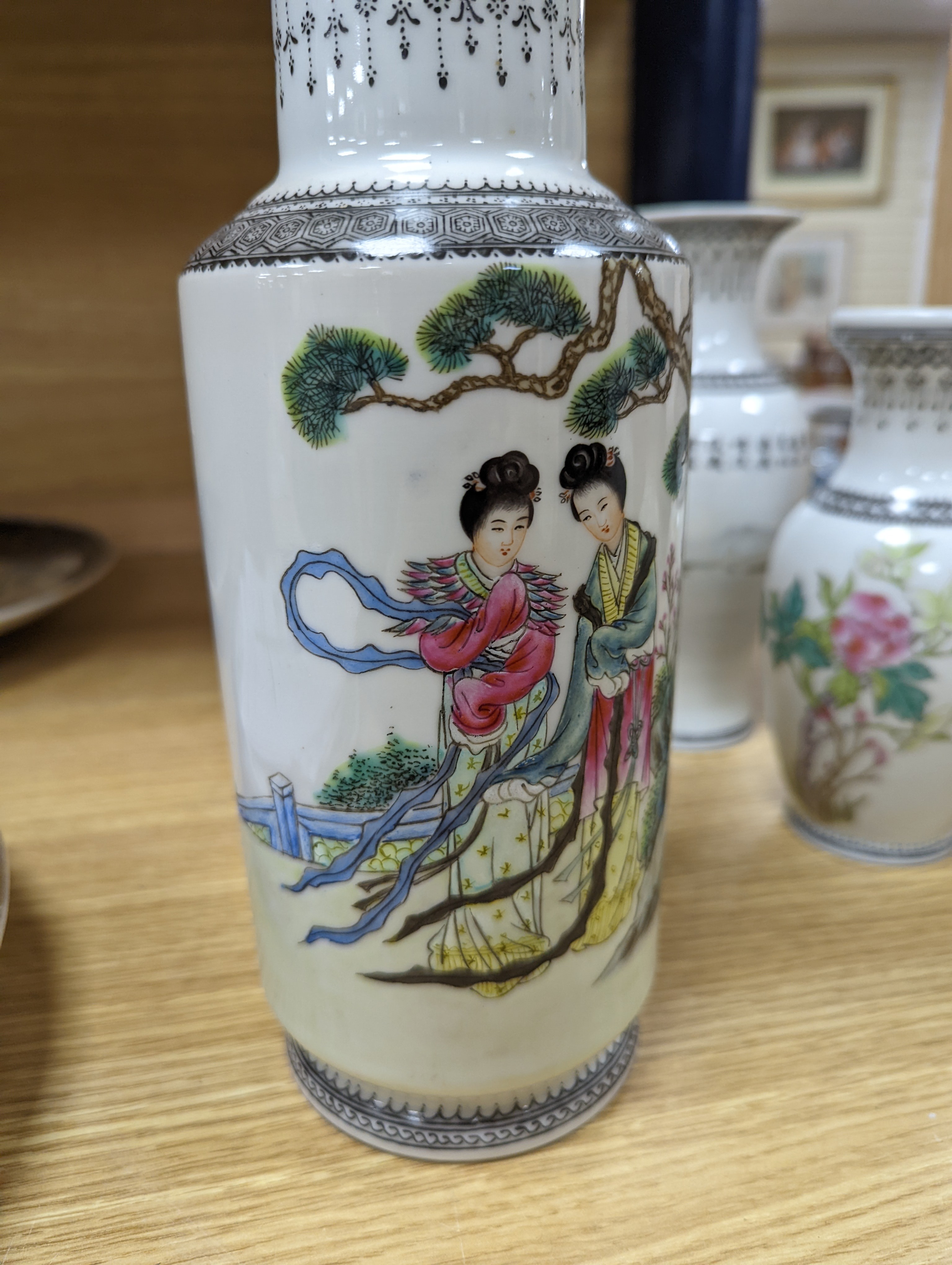 A group of seven Chinese famille rose vases, 20th century